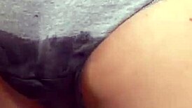 Blonde girl pees in her panties while alone at home