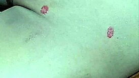 Myanmar gay twink uses hot wax in homemade solo session.