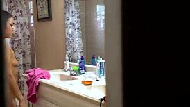 my stepsister kneels and looks at me while sucking