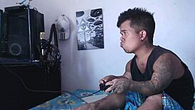 I’m so horny watching my hermanastra play with his cock while he games.