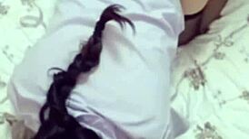 This sexy asian babe in black stockings looks so tempting.