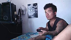 I’m so horny watching my hermanastra play with his cock while he games.