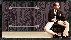 in the ziblizet intro film from 2015, an old gay daddy in costumes with garter belt and socks wears glasses