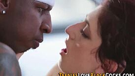 Athletic teen feels intense pleasure in interracial hardcore with big black cock.