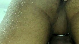 Two Muscular Friends Engage in Quick Group Activity