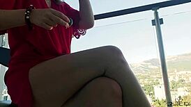 Blonde babe fingers her pussy by the window solo