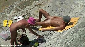 Yo, beach couple getting it on again! So hot! 🏖️