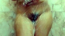 Chubby Indian woman with big natural tits masturbates in bathroom, begging for fuck.