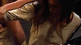 The huntress feeds her bound slave while inspecting the new european girl in leather bondage.