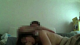 Asian with big tits sucking cock