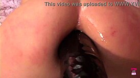 Redhead gets her ass fucked with toys and cum