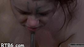 Beauty endures painful clamping on her features in intriguing bondage session