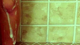 Eighteen-year-old blonde enjoys a relaxing hot shower