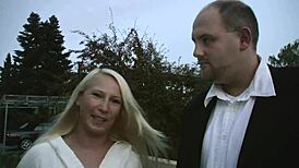 In this casting session, Gina from Dortmund performs licking, blowing, and doggystyle with Peter, leading to cumshot.