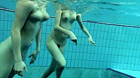 Anna Netrebko and Lada Poeschuk in an underwater lesbian scene