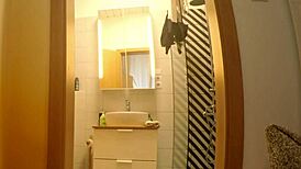 solo tattooed babe preps for porn with no panties in kitchen