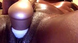 Watch Mrsfeedme play with her creamy ebony pussy for 7 full minutes