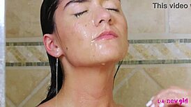 Cute brunette transforms shower into steamy play. Her petite frame seduces on the sofa with ease.