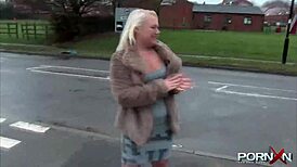 pornxn mature blonde pissing in public on the street