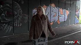 pornxn mature blonde pissing in public on the street