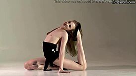 Sofia zhiraf, skinny sexy blondie, flexes in athletic workout on sofa