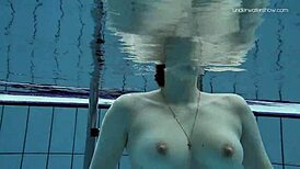 Lada Poleshuk shows off her big boobs and smooth skin in the pool