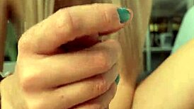my girlfriend gives a close-up handjob to me, her blonde babe with small tits, leading to cumshot on day 45.
