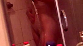 beauty in the shower pleasures herself quietly