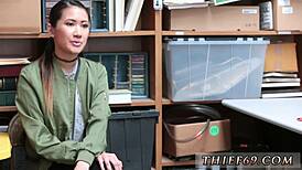 Asian woman in police uniform gives hardcore interracial blowjob while discussing habitual theft