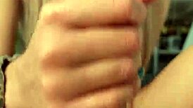my girlfriend gives a close-up handjob to me, her blonde babe with small tits, leading to cumshot on day 45.