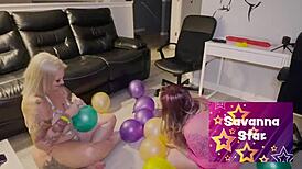 Nerdy Lesbians In Fishnets Play With Balloons And Dildos