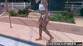 chilling at the pool, stripping down to show off my cute ebony bubble butt jiggling naked