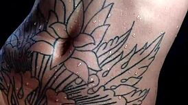 Hey, watch this hot tranny squirting backstage on webcam with wild tattooed action!