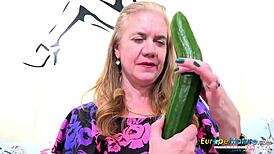 Hey, check this horny mature granny with cucumber and toys