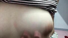 Filipina girlfriend flashes natural tits while alone at home