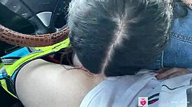 Petite brunette gets blown in public in a Porsche