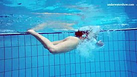 horny teen 18+ strips fast in pool showing tight pussy underwater