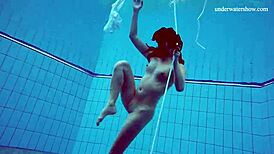 horny teen 18+ strips fast in pool showing tight pussy underwater