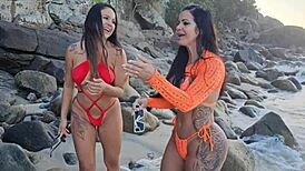 Two hot latinas suck big cock on beach!
