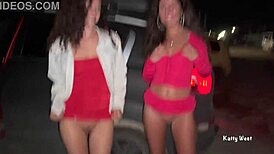 Two teen girls pissing openly by the car