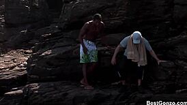 Busty Blonde Tarra White Rocks Ocean Threesome with Epic Blowjobs