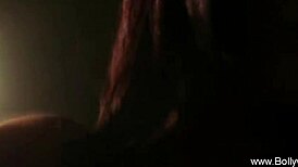 A sensual brunette dancer teases nude in the night, her erotic moves arousing deeply.