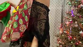 Anna Maria, a mature and beautiful Latina, wears red lingerie in this Christmas-themed porn movie