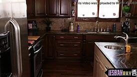 Brunette lesbian couple engages in oral sex at the office