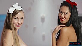 two petite teen models undressing each other in mini skirts