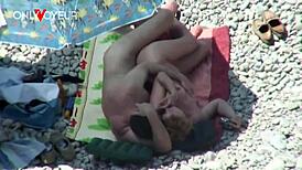 mature couple caught fucking on the beach under the bright sun