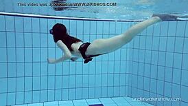 Naked pool scene with teenage brunette Roxana Cheh