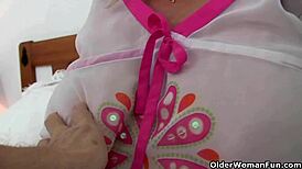 British Big-Boobed Isabel Rubs Her Old Clit Hard