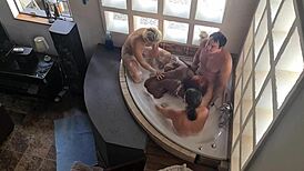 Spa bath turns into reverse gangbang with three girls