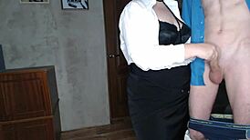 Slutty secretary can’t resist jerking her boss’s big cock in the office. Nylon fetish adds extra heat.